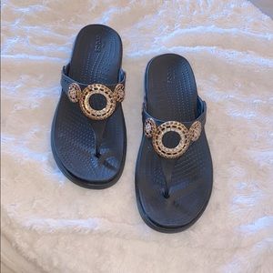 Crocs embellished flip flops